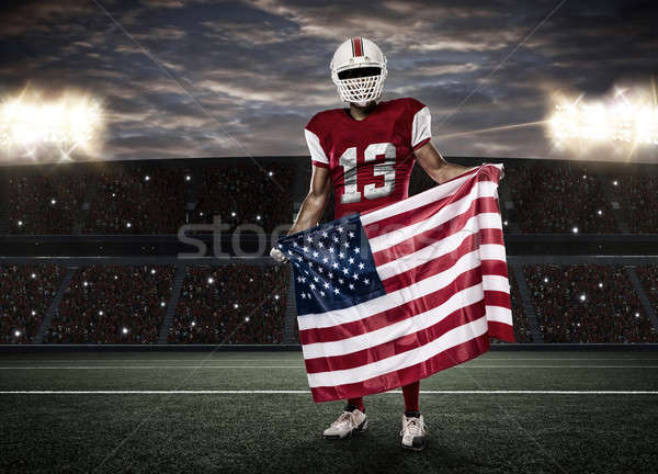 Foto stock: Futbolista · rojo · uniforme · bandera · de · Estados · Unidos · estadio · deporte