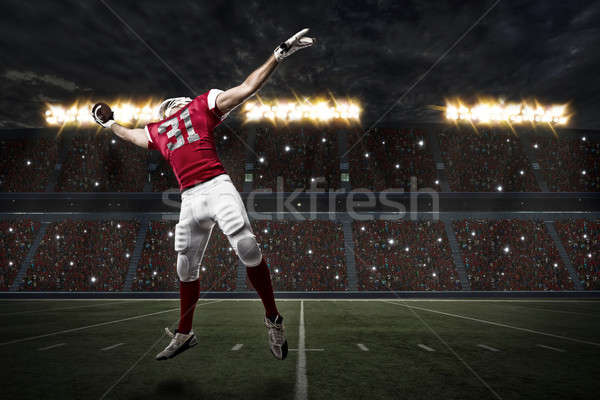 Futballista piros egyenruha labda stadion sport Stock fotó © betochagas