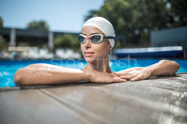 Menina nadar piscina jovem branco boné Foto stock © bezikus