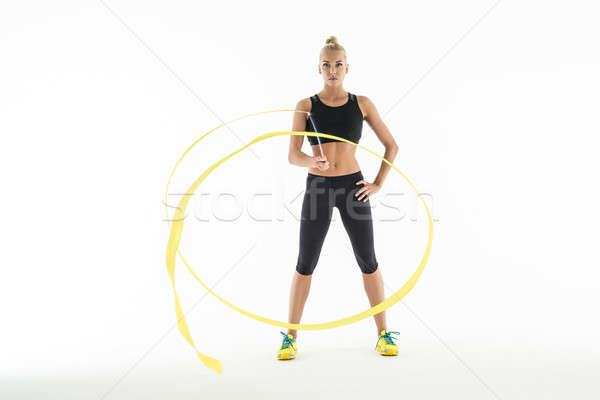 Rhythmic gymnast doing exercise with a ribbon Stock photo © bezikus