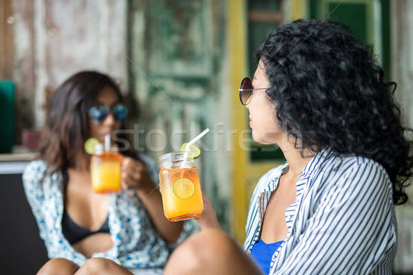 Girls with cocktails Stock photo © bezikus