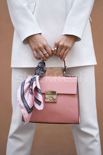 Model with bag outdoors Stock photo © bezikus