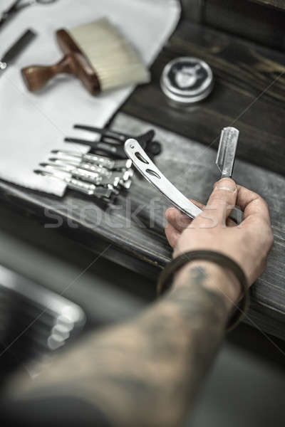 Közelkép fotó egyenes penge kéz tetoválás Stock fotó © bezikus
