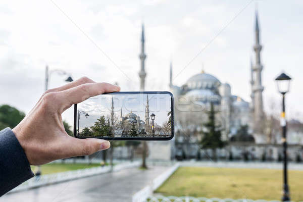 Híres kék mecset Isztambul férfi kéz Stock fotó © bezikus