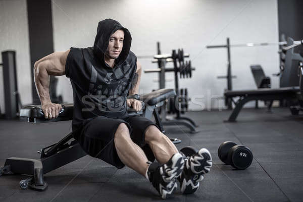 Brutal man in gym Stock photo © bezikus