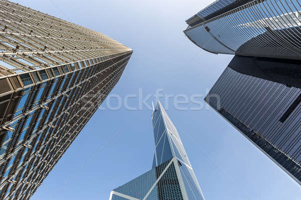 Tops of skyscrapers and blue sky Stock photo © bezikus