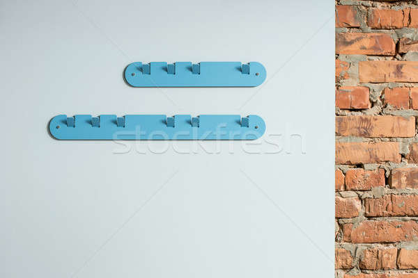 Metal blue hangers Stock photo © bezikus