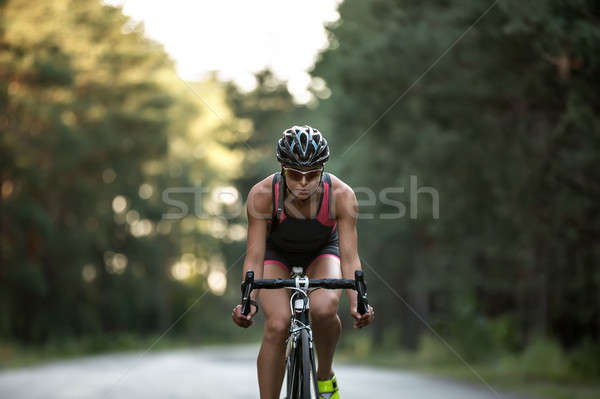 Menina bicicleta estrada natureza Foto stock © bezikus