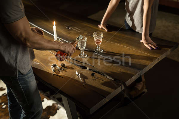 Man and woman near table Stock photo © bezikus