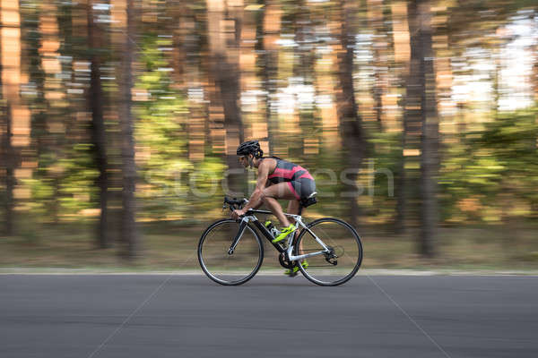 Menina bicicleta estrada natureza Foto stock © bezikus