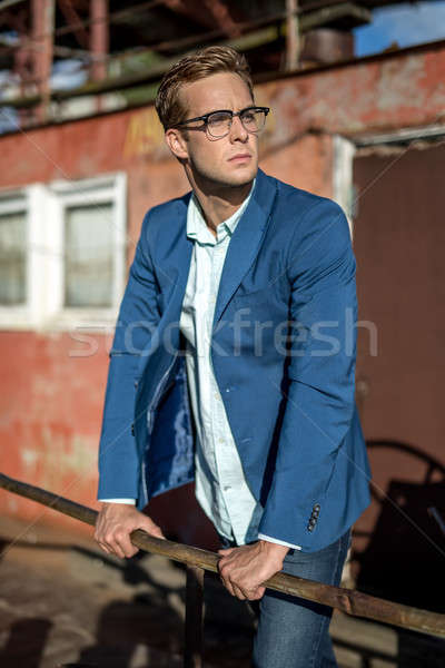 Guy in glasses outdoors Stock photo © bezikus