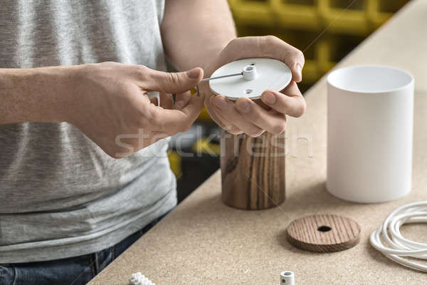 Guy using wrench in workshop Stock photo © bezikus