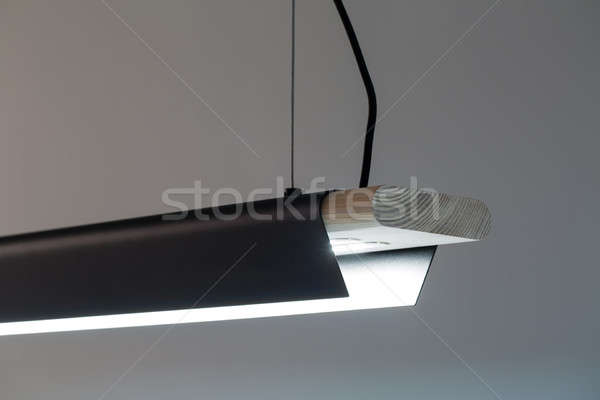 Hanging luminous wooden-metallic lamp Stock photo © bezikus