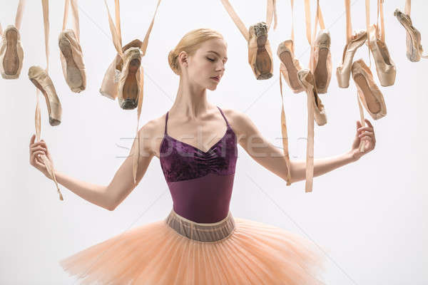 Blonde ballerina and pointe shoes Stock photo © bezikus