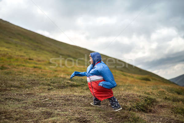 Stock photo: Boy walks on mountain