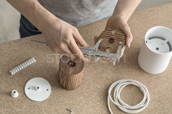 Man using caliper in workshop  Stock photo © bezikus