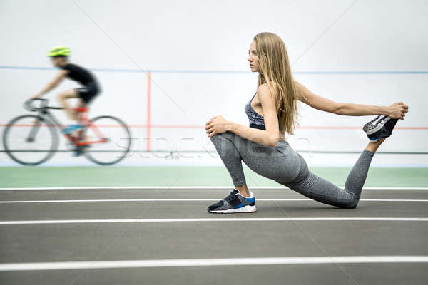 Stock photo: Athletic girl training outdoors