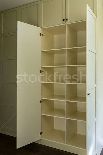 Modern ruhásszekrény polcok fény citromsárga kinyitott Stock fotó © bezikus