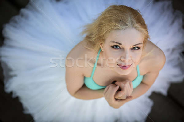 Close portrait of a cute ballerina in white tutu and blue bathin Stock photo © bezikus