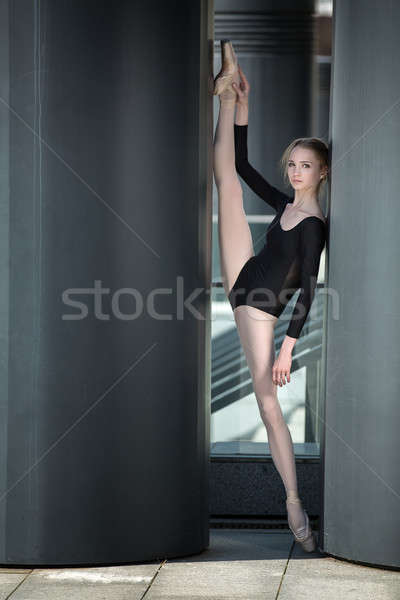 Young graceful ballerina in black bathing suit Stock photo © bezikus