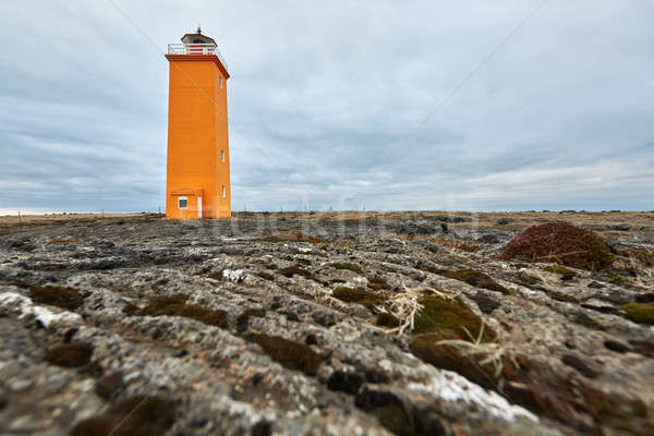 Icelandic landscape with orange lighthouse Stock photo © bezikus