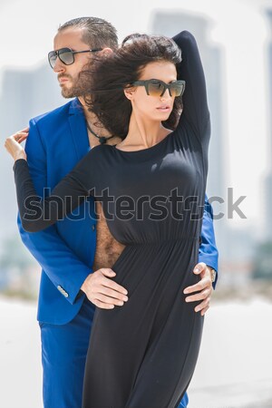 Couple on the background of skyscrapers Stock photo © bezikus