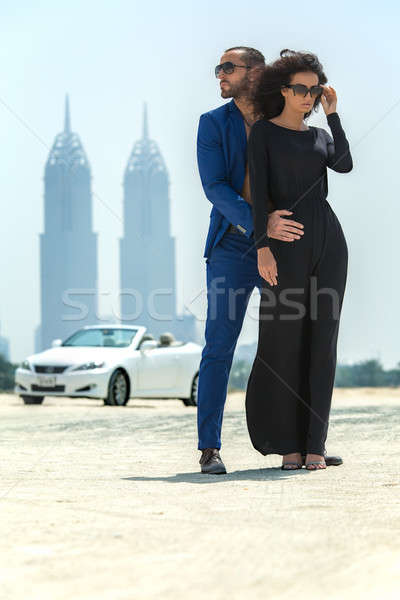 Couple on the background of skyscrapers Stock photo © bezikus