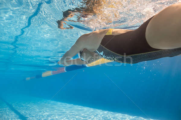 Girl swims in crawl style underwater Stock photo © bezikus