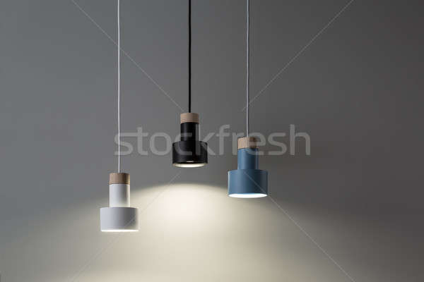 Hanging luminous colorful lamps Stock photo © bezikus
