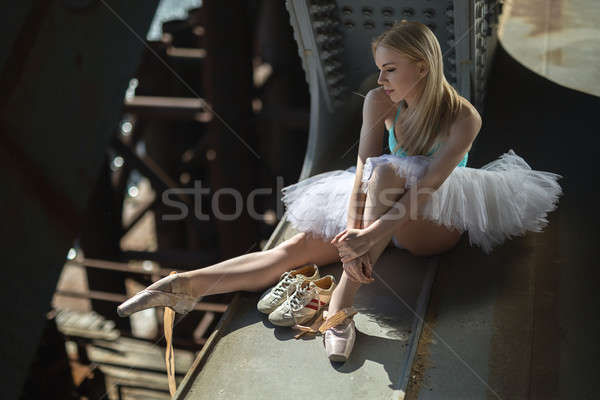 Ballerina sitting on the edge of bridge Stock photo © bezikus