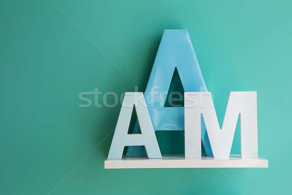 Letters A and M on a white shelf. Stock photo © bezikus