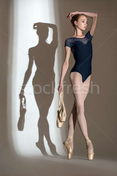 Full growth portrait of the graceful ballerina in a studio  Stock photo © bezikus