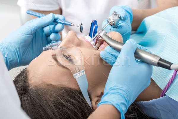 Woman at dentist's office Stock photo © bezikus
