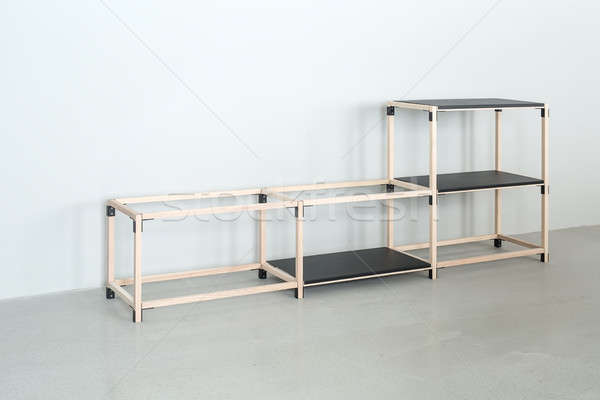 Light wooden construct with black tabletops Stock photo © bezikus