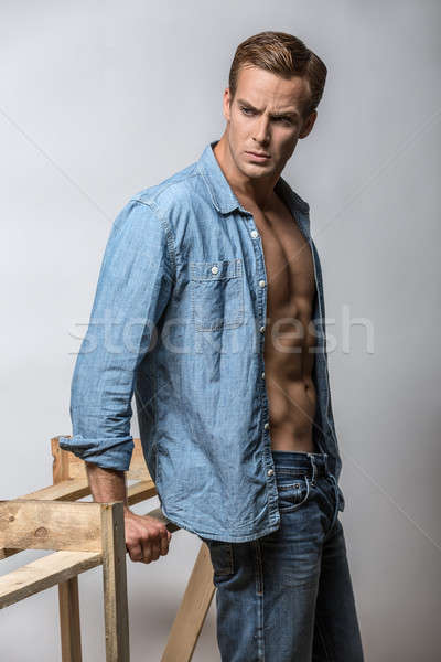 Man in unbuttoned shirt Stock photo © bezikus