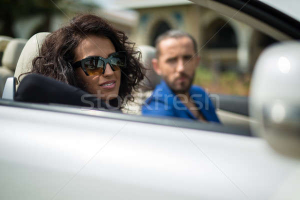 Para samochodu młoda kobieta wspaniały ciemne włosy Zdjęcia stock © bezikus