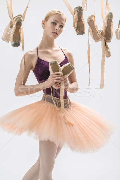 Blonde ballerina with pointe shoes Stock photo © bezikus