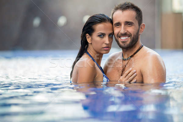 Couple in the pool Stock photo © bezikus