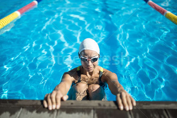 Menina nadar piscina feminino Foto stock © bezikus