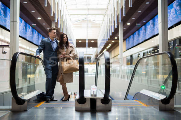 Young couple on the escalator Stock photo © bezikus