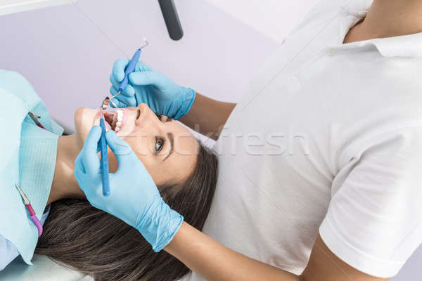 Girl at dentist's office Stock photo © bezikus