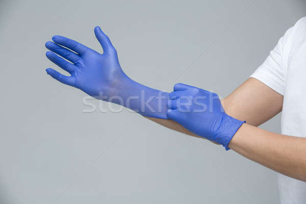 Medici guanti medico blu mani studio Foto d'archivio © bezikus