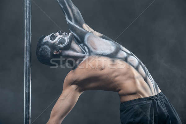 Foto stock: Masculino · pólo · dançarina · posando · escuro · estúdio