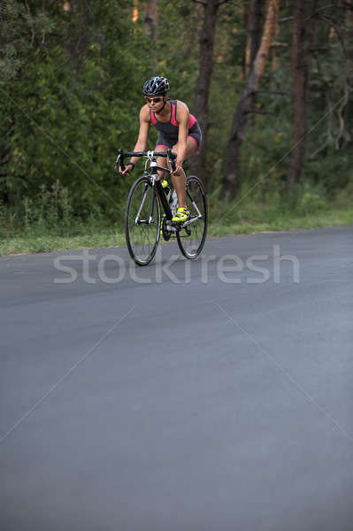 Menina bicicleta atraente estrada natureza Foto stock © bezikus