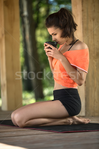 Yoga girl with cup Stock photo © bezikus