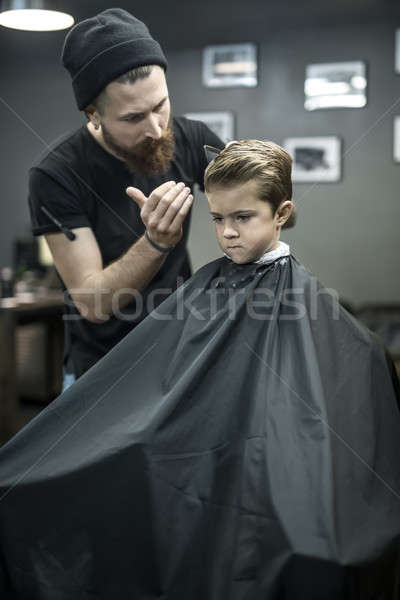 Kid's hair styling in barbershop Stock photo © bezikus