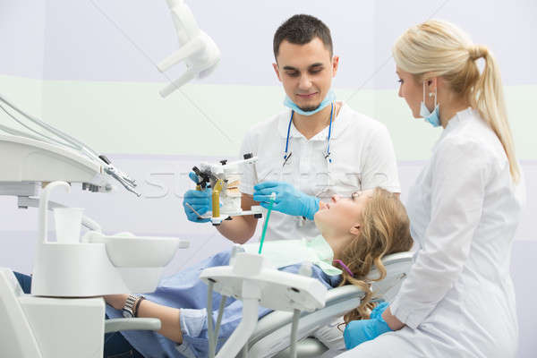 Paciente odontología agradable nina azul camisa Foto stock © bezikus