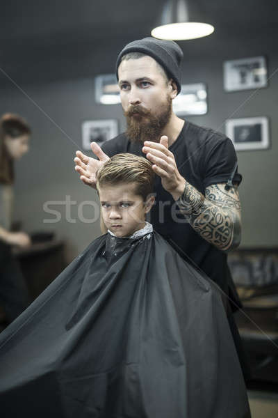 Kid's hair styling in barbershop Stock photo © bezikus