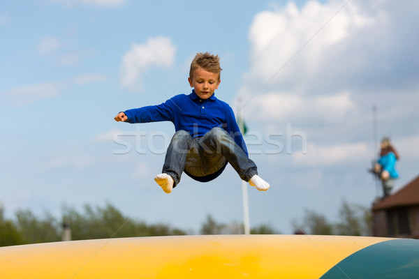 Jumping boy Stock photo © bigandt