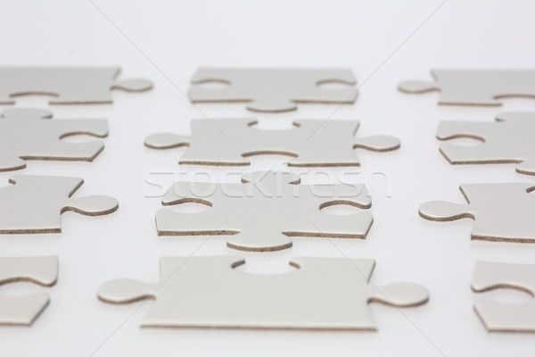 Rows of Jigsaw Puzzle Pieces Stock photo © bigandt